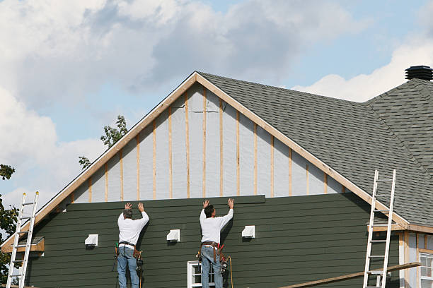 Professional Storm Damage Siding Repair technician working in Watertown, MN